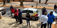 Members of the media outside a building in rosebank johannesburg, hawks arrested the alleged masterminds in the free state asbestos audit scandal Photo:Sipho Ngwema/Facebook