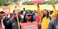 PRETORIA, SOUTH AFRICA - APRIL 25: Protesters during the South African Federation of Trade Unions (SAFTU) general strike at Union Buildings on April 25, 2022 in Pretoria, South Africa. The group demanded an end to budget cuts, an end to neoliberalism and an end to attacks on bargaining council among other demands. (Photo by Gallo Images/Lee Warren)