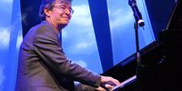 29 March 2008: Darius Brubeck plays piano with the University of KwaZulu-Natal Rolling Reunion Band at the Cape Town International Jazz Festival. (Photograph by Rodger Bosch/ AFP)