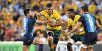 Rory Arnold (2nd from left) of the Wallabies is tackled by Jeronimo De La Fuente (left) of the Pumas during the Rugby Championship match between Australia and Argentina at Suncorp Stadium in Brisbane, Australia, July 27, 2019.  (Photo: EPA-EFE/DARREN ENGLAND )