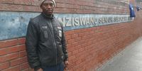 Brown’s Farm resident and voting district co-ordinator Mzingisi Jwili outside a voting station in Philippi, Cape Town. He had been at the voting station since 6.30am. (Photo: Suné Payne)