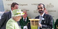 Queen Elizabeth presents a horse racing award to Dubai’s ruler Sheikh Mohammed at Ascot in June 2019. (Photo: Dubai Media Office)