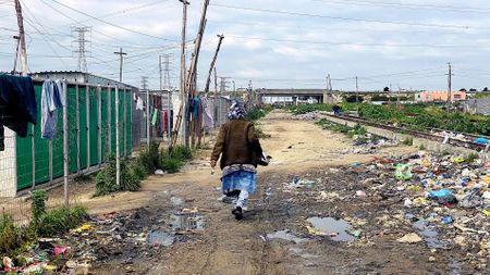 Cape Town families left on neglected Prasa land protest, close busy R300