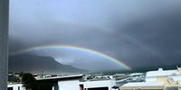 [Double Rainbow luck in Camps Bay, Cape Town]. Photographer: [Chris von Ulmenstein]. 