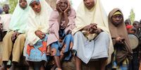 Students, who escaped from gunmen, wait outside the school premises for their parents after gunmen abducted more than 300 students at the Jangebe Government Girls Secondary School, Zamfara State, Nigeria 26 February 2021. EPA-EFE/STR