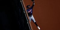 ANAHEIM, CALIFORNIA - AUGUST 14:  Nick Gordon #1 of the Minnesota Twins makes the out against Kurt Suzuki #24 of the Los Angeles Angels in the eighth inning at Angel Stadium of Anaheim on August 14, 2022 in Anaheim, California. (Photo by Ronald Martinez/Getty Images)