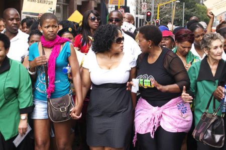 A man at a miniskirt march
