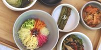 Hansang charim, a typical Korean lunch: Bibimbap, cucumber and seaweed broth, mushroom glass noodles, pork mandoo, kimchi and Perilla leaf preserve. (Photo: Supplied) 