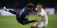 Desire Doue of PSG (L) and Matty Cash of Aston Villa (R) in action during the UEFA Champions League quarter-finals 1st leg soccer match between Paris Saint-Germain and Aston Villa, in Paris, France, 09 April 2025.  EPA-EFE/YOAN VALAT
