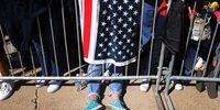 GOODYEAR, ARIZONA - OCTOBER 28: Supporters wait for the arrival of U.S. President Donald Trump during a campaign rally at Phoenix Goodyear Airport October 28, 2020 in Goodyear, Arizona. With less than a week until Election Day, Trump and his opponent, Democratic presidential nominee Joe Biden, are campaigning across the country. (Photo by Chip Somodevilla/Getty Images)