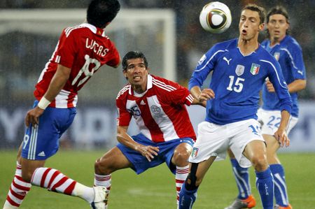 Italy and Paraguay draw after a hard, tough battle in the freezing rain