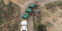 A  drone image showing a truck carrying three JoJo containers filled with water as it delivers water to residents in a village  outside Phuthaditjhaba, Free State. <br>Photo / Shiraaz Mohamed.