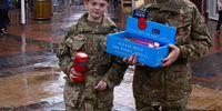 Two cadets from the UK military raise funds for the Royal British Legion on New Market Street, Chorley, UK, 2015. (Photo: Flickr)