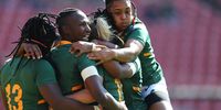Zintle Mpuha (left), Ayanda Malinga (middle) and Zenay Jordaan (right) mob Nadine Roos after she scored against Spain at Ellis Park. (Pic supplied by Saru).