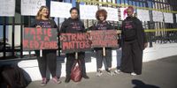 From right to left: Zorah Motasi, chairperson of Vroue in Aksie and members Johnne Adonia, Lydia Adonis and Beverly Damonse protest outside Parliament on Thursday 11 July 2019. Vroue in Aksie wants its concerns about gang violence in the Strand area to be heard. Members of various community policing forums attempted to hand a memorandum to police minister Bheki Cele. (Photo: Leila Dougan)