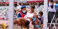 TOKYO, JAPAN - AUGUST 04: Thomas van der Plaetsen of Belgium lies injured in the sand pit after injuring himself in the men's decathlon long jump during the Athletics event on Day 12 of the Tokyo 2020 Olympic Games at the Olympic Stadium on August 04, 2021 Tokyo, Japan. (Photo by Roger Sedres/Gallo Images/Getty Images)