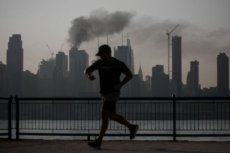 Crane collapses after catching fire in Manhattan, and more from around the world