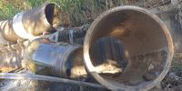 Effluent pours from a broken sewer line in Riverhorse Valley in Durban on 12 May. This pipeline has now been repaired. (Photo: Supplied)