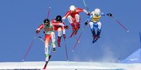 Alex Fiva of Switzerland, Alex Marro of Switzerland, Sandro Lohner of Switzerland and Youri Duplessis Kergomard of France, from left to right, speed down the track at the Ski Cross World Cup race in St. Moritz, Switzerland, 28 January 2024.  EPA-EFE/MAYK WENDT