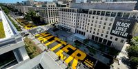 WASHINGTON, DC - MAY 13: Black Lives Matter Plaza on 16th Street is repainted following the removal of the lettering for a construction project on May 13, 2021 in Washington, DC. The words "Black Lives Matter" was painted on the two block section of 16th Street last year in the wake of the George Floyd protest. (Photo by Kevin Dietsch/Getty Images)