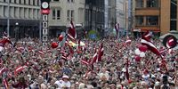Latvia's hockey national team supporters react during a welcoming ceremony for the Latvian hockey team at the Freedom Monument in Riga, Latvia, 29 May 2023. The Latvian hockey team on 28 May scored a bronze medal for the first time in its history, sparking nation-wide celebrations.Tens of thousands of people gathered around the Freedom Monument to greet the players. During an extraordinary session late 28 May, the Saeima - the Latvian parliament - decided to declare 29 May 2023 the Day of the Bronze Medal Win to honor the teamÕs highest achievement.  EPA-EFE/TOMS KALNINS