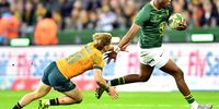 Aphelele Fassi of the Springboks tackled by Tate McDermott of Australia during the Castle Lager Rugby Championship match between South Africa and Australia at DHL Stadium on August 23, 2025 in Cape Town, South Africa. (Photo: Ashley Vlotman / Gallo Images)