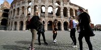 epa08249195 Tourists wearing protective face masks visit Rome, Italy, 26 February 2020. According to the latest official statistics, more than 370 people have been infected by the Wuhan coronavirus, and at least 12 have died of COVID-19 in the Mediterranean country so far.  EPA-EFE/ETTORE FERRARI