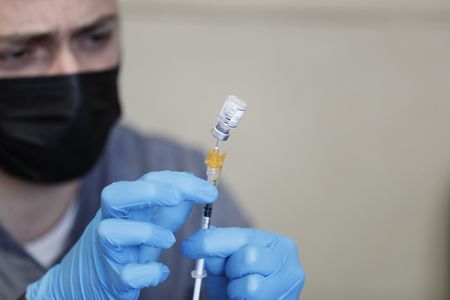 As Covid-19 cases rise, U.S. health officials mull widening additional booster eligibility