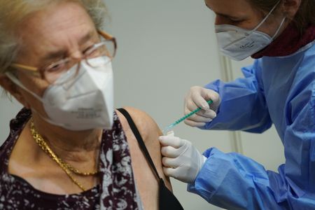 Scholz secures agreement allowing expats in China to use BioNTech Covid-19 vaccine
