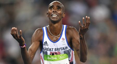 There's Mo stopping him! Farah does the double-double