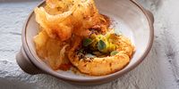 Tirokafteri (spicy Greek feta dip) with crisps. (Photo: Jan Ras Photography)