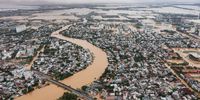 An aerial view shows flooded areas on November 3, 2025 in Hue, Vietnam. Central Vietnam has been hit by heavy rain that triggered flooding since October 26, killing at least 35 people. (Photo by Thanh Hue/Getty Images)