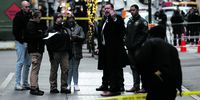 epaselect epa11756727 Police investigators at the scene where UnitedHealthcare�s CEO Brian Thompson was shot and killed in an apparent targeted attack as he was en-route to to attend UnitedHealthcare�s annual investor conference in New York, New York, USA, 04 December 2024. The masked gunman is still being sought following the early morning shooting in Manhattan after fleeing towards Central Park.  EPA-EFE/JUSTIN LANE