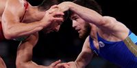 CHIBA, JAPAN - AUGUST 04:   Reza Atrinagharchi of Team Islamic Republic of Iran competes against Zavur Uguev of Team ROC during the Men’s Freestyle 57kg Semi Final on day twelve of the Tokyo 2020 Olympic Games at Makuhari Messe Hall on August 04, 2021 in Chiba, Japan. (Photo by Maddie Meyer/Getty Images)