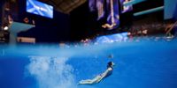Fukuoka 2023 World Aquatics Championships - Diving - Fukuoka Prefectural Pool, Fukuoka, Japan - July 18, 2023 A diver in action during a practice session REUTERS/Stefan Wermuth     TPX IMAGES OF THE DAY