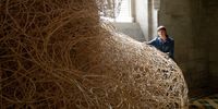 PONTOISE, FRANCE - APRIL 28: (EDITORS NOTE: EDITORIAL USE ONLY). British artist and sculptor Laura Ellen Bacon poses with her artwork at the ‘Abbaye De Maubuisson’ on April 28, 2022 in Saint-Ouen-l'Aumone, France. The exhibition "Chaque fibre de son être" (Every Fibre Of My Being ) will take place from May 2 to August 28, 2022. (Photo by Thierry Chesnot/Getty Images)