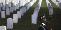 A member of the Military Honor Guard stands as U.S. President Joe Biden arrives to participate in a Presidential Armed Forces Full Honor Wreath-Laying Ceremony on the 100th anniversary of the Tomb of the Unknown Soldier at Arlington National Cemetery in Arlington, Virginia, U.S., on Thursday, Nov. 11, 2021. 2021 marks the centennial anniversary of the Tomb of the Unknown Soldier, providing a final resting place for one of America's unidentified World War I service members, and Unknowns from later wars were added in 1958 and 1984. Photographer: Oliver Contreras/Bloomberg via Getty Images