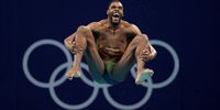 TOKYO, JAPAN - AUGUST 02: Yona Knight-Wisdom of Team Jamaica competes in the Men's 3m Springboard Preliminary Round on day ten of the Tokyo 2020 Olympic Games at Tokyo Aquatics Centre on August 02, 2021 in Tokyo, Japan. (Photo by Maddie Meyer/Getty Images)