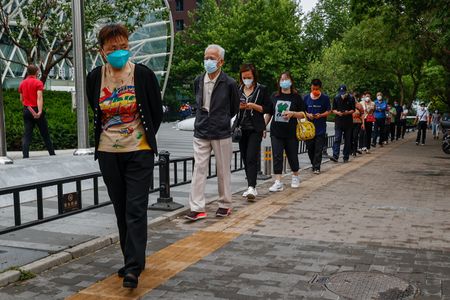 Beijing tests millions, isolates thousands over Covid-19 cluster at 24-hour bar