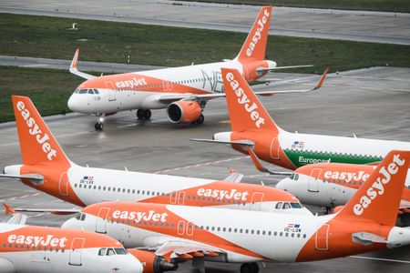 Surging Covid-19 cases force easyJet to cancel UK flights over staff shortages