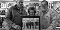 A camera shop dynasty: from left, Freddie Stolper, his mother Tannie Jane and his brother Charles. (Image Chris Marais)