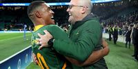 Nienaber celebrates with Damian Willemse after their 2713 win over England at Twickenham on November 26, 2022. (Photo: David Rogers/Getty Images).