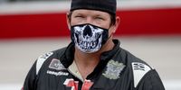 DARLINGTON, SOUTH CAROLINA - MAY 21: Josh Williams, driver of the #92 OpenForBusiness/ChasingFreedom, stands on pit road during the national anthem prior to the NASCAR Xfinity Series Toyota 200 at Darlington Raceway on May 21, 2020 in Darlington, South Carolina. (Photo by Chris Graythen/Getty Images)