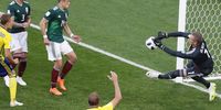 epa06844647 Javier Hernandez (3-L) of Mexico and goalkeeper Robin Olsen (R) of Sweden in action during the FIFA World Cup 2018 group F preliminary round soccer match between Mexico and Sweden in Ekaterinburg, Russia, 27 June 2018.</p>
<p>(RESTRICTIONS APPLY: Editorial Use Only, not used in association with any commercial entity - Images must not be used in any form of alert service or push service of any kind including via mobile alert services, downloads to mobile devices or MMS messaging - Images must appear as still images and must not emulate match action video footage - No alteration is made to, and no text or image is superimposed over, any published image which: (a) intentionally obscures or removes a sponsor identification image; or (b) adds or overlays the commercial identification of any third party which is not officially associated with the FIFA World Cup)  EPA-EFE/ROMAN PILIPEY   EDITORIAL USE ONLY