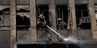 Firefighters at work at the Cape York building in downtown Johannesburg where a blaze broke out in July 2017. Seven people died while another seven were admitted to hospital; at least 50 were rescued. (Photo: Sandile Ndlovu / Sowetan / Gallo Images)