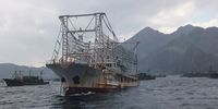 A Chinese ship docked in Ulleung Island, South Korea. May 2019 (Photo: The Outlaw Ocean Project/Fábio Nascimento)
