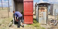 Villagers in Thaba ’Nchu ward 39 use these zinc toilets they built themselves. (Photo: Yamkela Mopeli)
