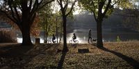 A family walks at Zoo Lake during the national lockdown initiated as a result of the COVID-19 disease and coronavirus pandemic, in Johannesburg, South Africa, 19 May 2020. The country is at level 4 of the national lockdown.  EPA-EFE/KIM LUDBROOK