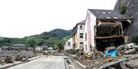 epa09358263 A view of a partially destroyed house after the flooding of the Ahr River, in Mayschoss in the district of Ahrweiler, Germany, 22 July 2021. Large parts of Western Germany were hit by heavy, continuous rain in the night to 15 July resulting in local flash floods that destroyed buildings and swept away cars.  EPA-EFE/FRIEDEMANN VOGEL