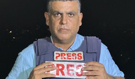 International Person of the Year runners-up: Journalists across the world and Narges Mohammadi